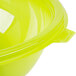 A close up of a green Fineline PET plastic salad bowl.