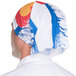 A person wearing a Colorado state flag themed Headsweats headband.