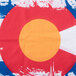 A white Headsweats headband with a red, white, blue, and yellow Colorado flag circle.