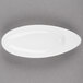 An Arcoroc white porcelain oval dish.