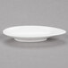 An Arcoroc white porcelain oval dish with a small bowl.
