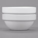 Two Arcoroc white porcelain stackable bowls.