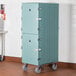A large blue Cambro double compartment tray and sheet pan carrier on wheels.