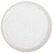 A white stoneware side plate with a tan rim and circular pattern.