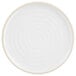A white Chef & Sommelier stackable plate with a white rim decorated with a circular pattern.