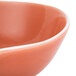 An Arcoroc Canyon Ridge bowl with a pink rim and white interior.