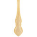 A 10 Strawberry Street Crown Royal stainless steel teaspoon with a gold-plated handle.