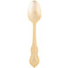 A 10 Strawberry Street Crown Royal stainless steel teaspoon with a gold-plated handle on a white background.