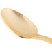 A close up of a 10 Strawberry Street Crown Royal gold plated stainless steel teaspoon with a white background.