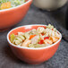 An Arcoroc Canyon Ridge porcelain bowl filled with pasta and vegetables.