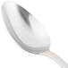 A 10 Strawberry Street stainless steel teaspoon with a gold handle.