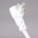 The white plug with two silver ends on a Curtron PEST PRO 150 insect trap wall sconce.