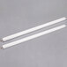 A pair of white Curtron Pest-Pro UV light tubes with metal tips.