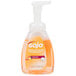 A bottle of GOJO Fresh Fruit foaming hand soap with a pump.