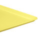 A yellow fiberglass MFG Tray display tray.