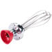 A red and silver metal whisk attachment with a red handle.