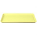 A yellow rectangular tray on a white background.