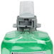 A bottle of GOJO green liquid soap.