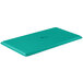 A mint green rectangular MFG Tray on a table.