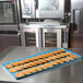 A Sky Blue MFG Fiberglass Supreme Display Tray of cookies on a kitchen counter.