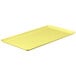 A yellow rectangular MFG Tray on a white background.