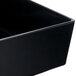 A black rectangular Tablecraft melamine bowl.