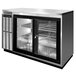 A Continental Refrigerator stainless steel back bar refrigerator with sliding glass doors.