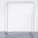 A clear plastic lid for a clear square beverage dispenser.
