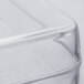 A clear plastic lid on top of a glass beverage dispenser.