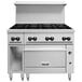 A Vulcan commercial gas range with 8 burners, a convection oven, and a cabinet base.