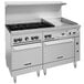 A large stainless steel Vulcan commercial range with 6 burners, a griddle, and 2 ovens.
