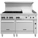 A large white Vulcan commercial gas range with 6 burners, a thermostatic griddle, and 2 ovens.