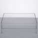 A clear rectangular lid on a white surface.