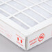 A white box with a Perfect Fry HEPA and carbon air filter cartridge set inside.