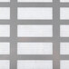 A close up of a white HEPA filter with metal grating.