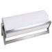 A Bulman stainless steel paper roll dispenser with serrated blade holding a roll of paper.