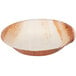 A close up of a TreeVive by EcoChoice round palm leaf bowl with a white surface and brown wood finish.
