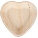 A close-up of a TreeVive by EcoChoice heart shaped wooden plate.