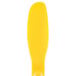 A yellow plastic HS Inc. sandwich spreader.