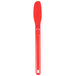 A red polypropylene sandwich spreader with a white background.