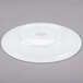 A white Libbey Reflections porcelain coupe plate with a circular rim.