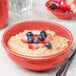 A Libbey Cantina oatmeal bowl filled with oatmeal and fruit.