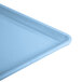 A close-up of a blue Cambro dietary tray.