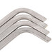 A set of four stainless steel APW Wyott Flat Top Roller Grill dividers.