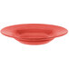 A red Libbey porcelain pasta bowl on a white background.