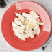 A plate of pasta with sauce in a Libbey Cantina porcelain pasta bowl.
