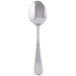A Libbey stainless steel dessert spoon with an egg shaped bowl and a tall handle.