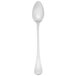 A Libbey stainless steel iced tea spoon with a white handle and silver spoon.