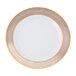 A white porcelain luncheon plate with gold trim.