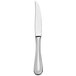 A close up of a Libbey stainless steel steak knife with a white background.